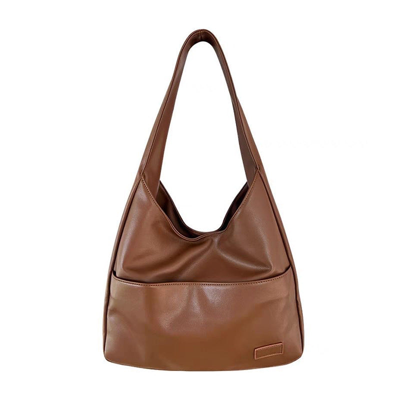 Soft leather tote bag Large capacity brown bucket bag Versatile commuting shoulder bag for women