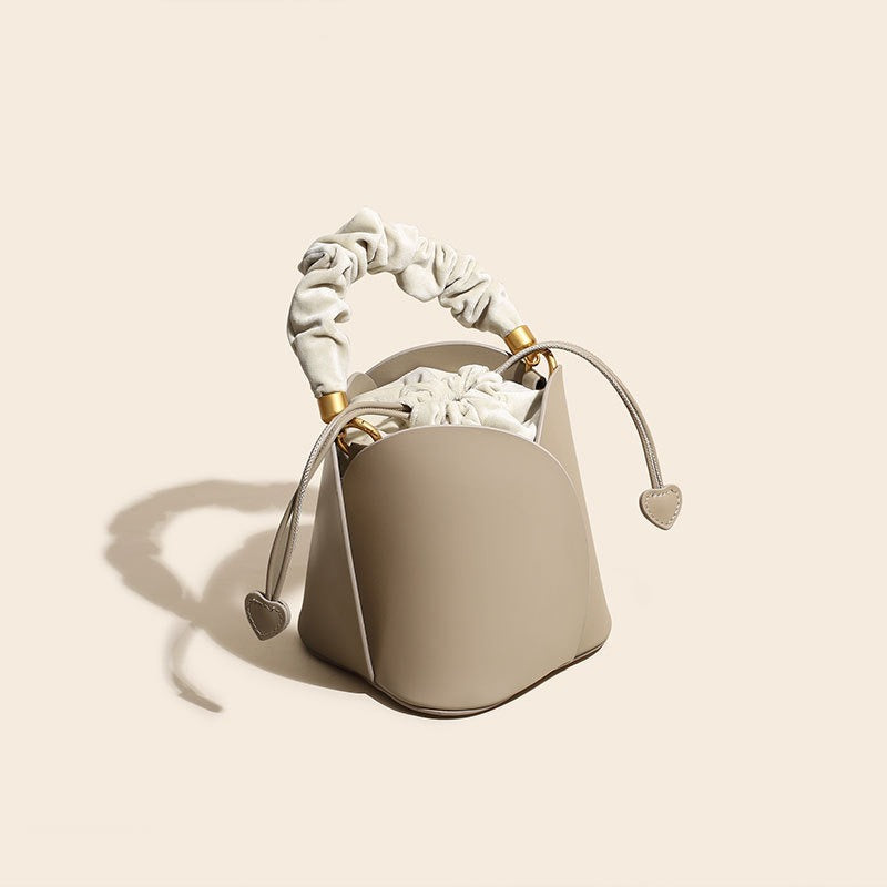 Bucket bag women summer new all match one shoulder Messenger small bag niche design leather handbag